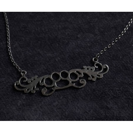 Collier poing américain "arabesque"